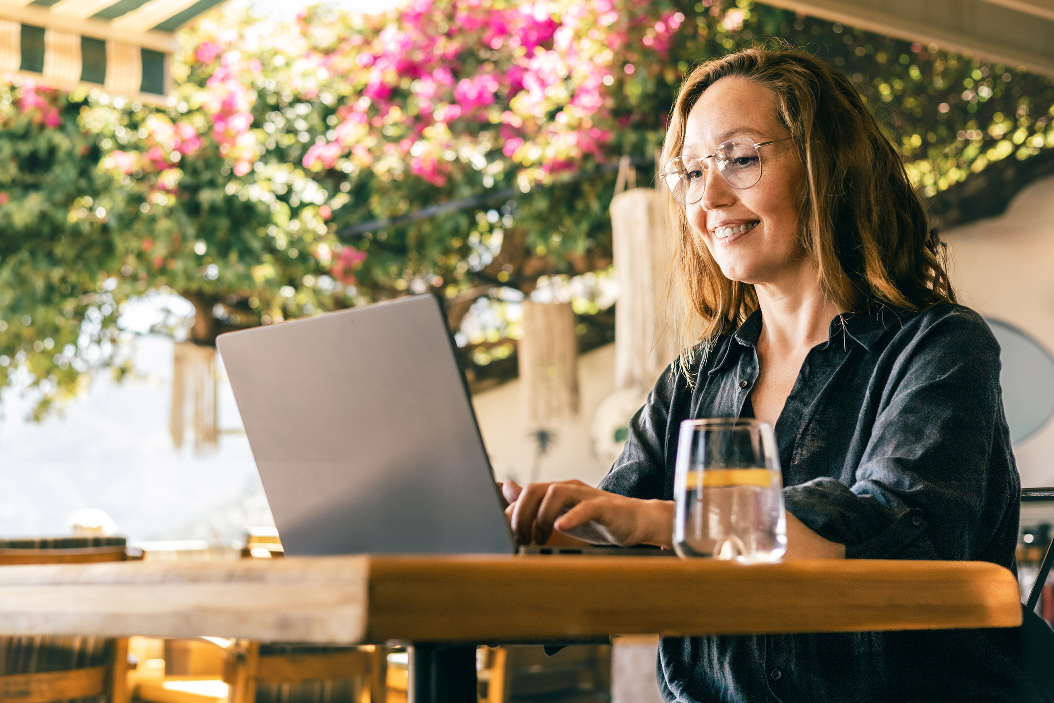 Remote worker attending an online team meeting | Health insurance for remote workers